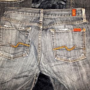 Flared distressed jeans